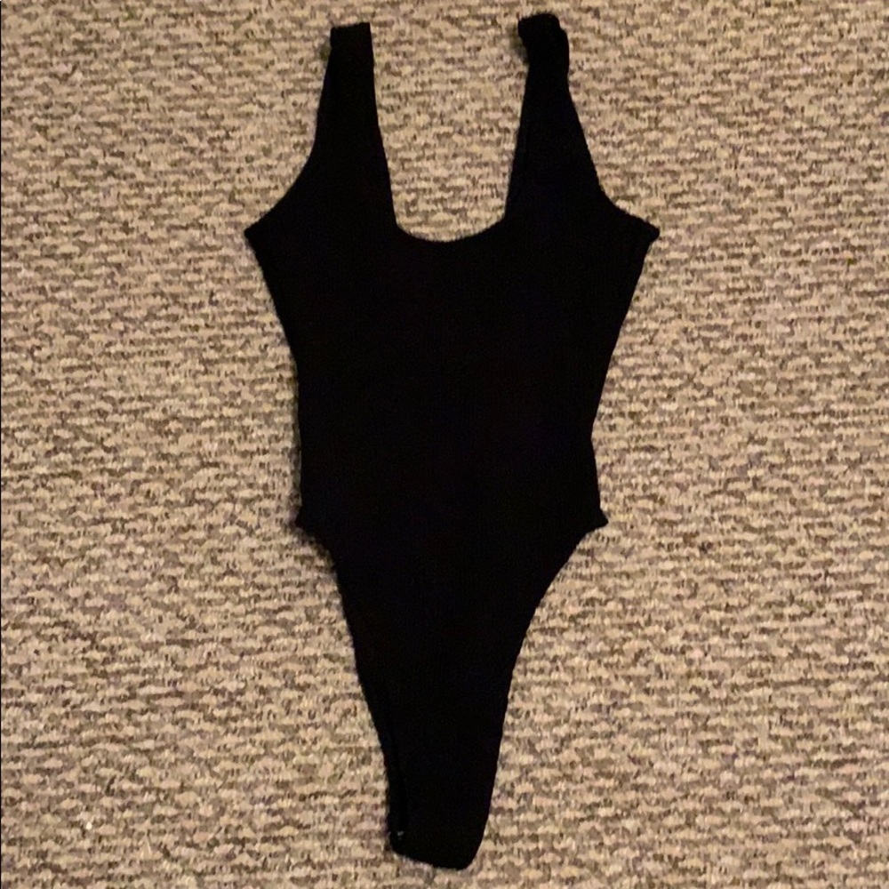 NWT black ribbed one piece